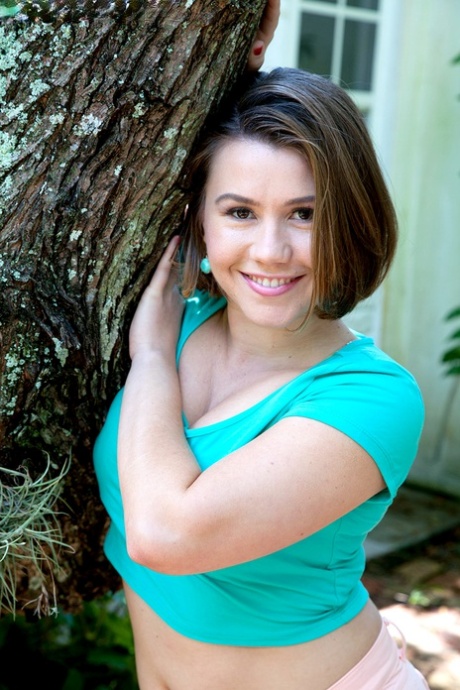 Busty cutie Malyca loves to show off her perky tits and plump ass outdoors