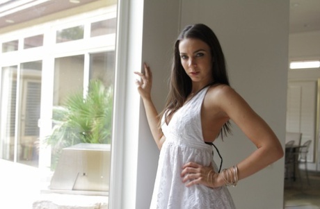 American woman Tiffany Tyler flashes with big boobs and her tasty cunt