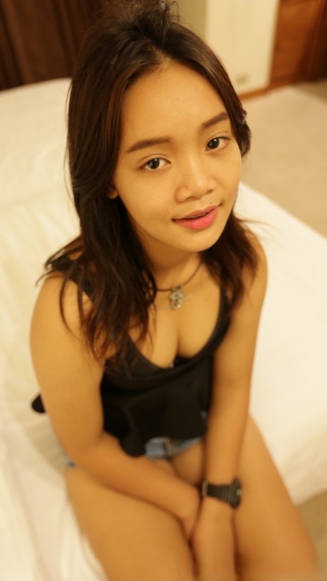 Barely legal Thai girl eats a man's ass before bareback sex in motel room