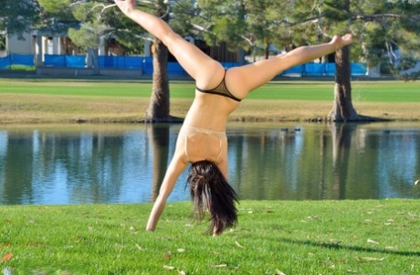 Flexible teen sports no panty upskirts before getting naked at a park