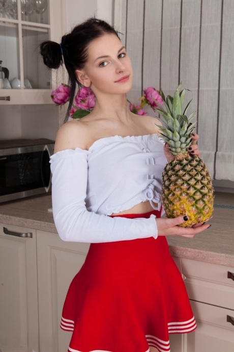 Teen first timer Vienna showcases her bald pussy with her hair in puff balls