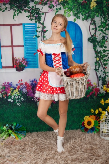 Cosplay cutie Flower sheds her costume to pose nude on her knees in socks