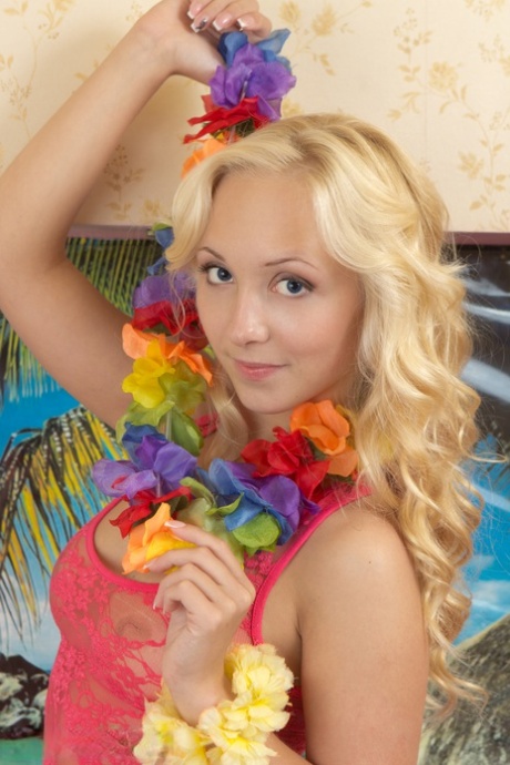 Young blonde girl Linet gets naked after attending a luau