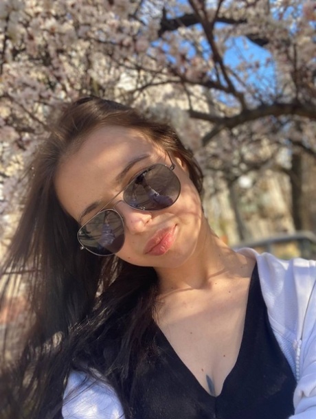 Sweet brunette teen Molly Lo takes a series of non-nude self shots