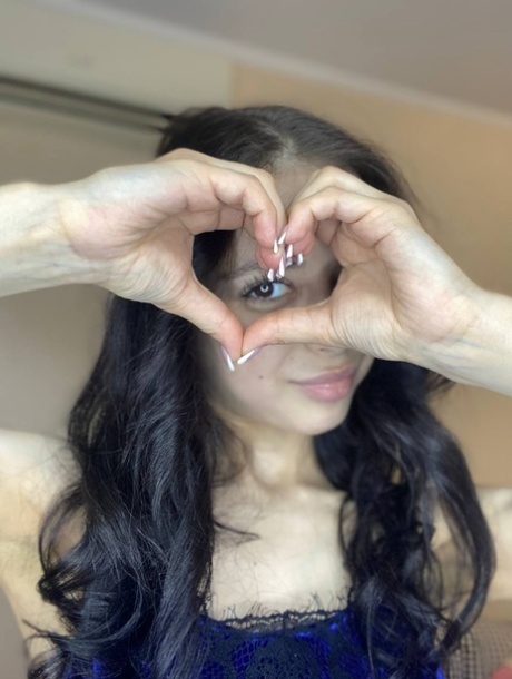 Sweet brunette teen Molly Lo takes a series of non-nude self shots