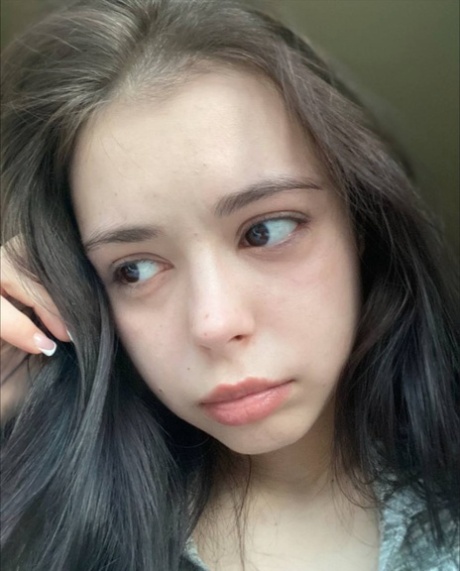 Sweet brunette teen Molly Lo takes a series of non-nude self shots