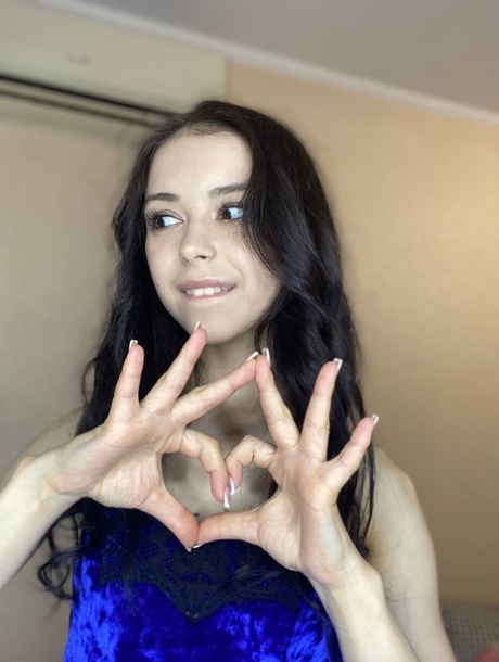 Sweet brunette teen Molly Lo takes a series of non-nude self shots