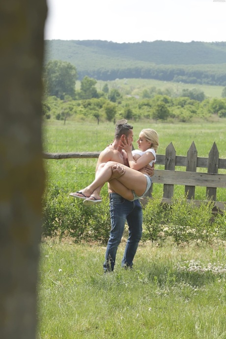 Adorable blondie Melanie Gold gets her pussy stuffed on the wooden table