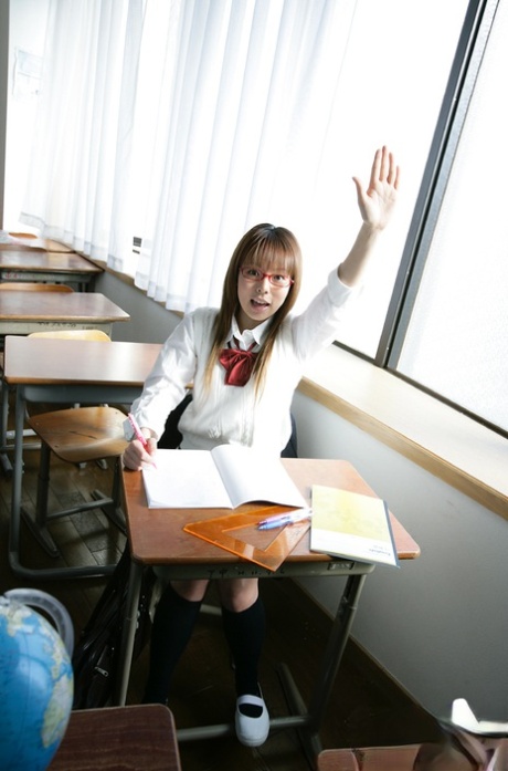 Hot asian schoolgirl Yume Kimino taking off her skirt and panties