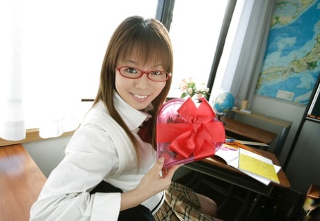 Hot asian schoolgirl Yume Kimino taking off her skirt and panties