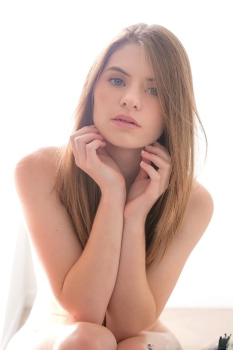 Long-haired teenage sweetie Alice March gets rid of her uniform and panties