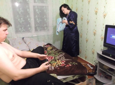 Naughty brunette MILF plays with her horny pussy and fucks her stepson