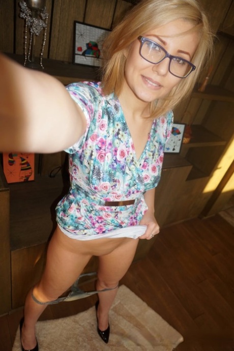 Naughty blonde amateur shows her lovely tits & takes selfies around the house