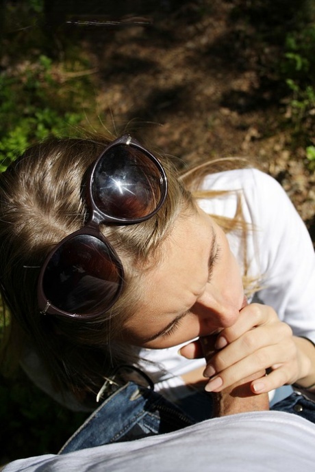 Hot teen Megan gives a POV blowjob while showing her tits in cottage country