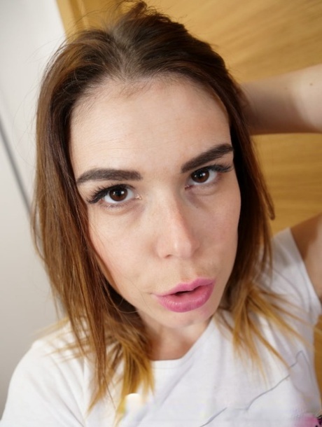 Brunette sweetie exposes her tiny boobs and fabulous ass up close