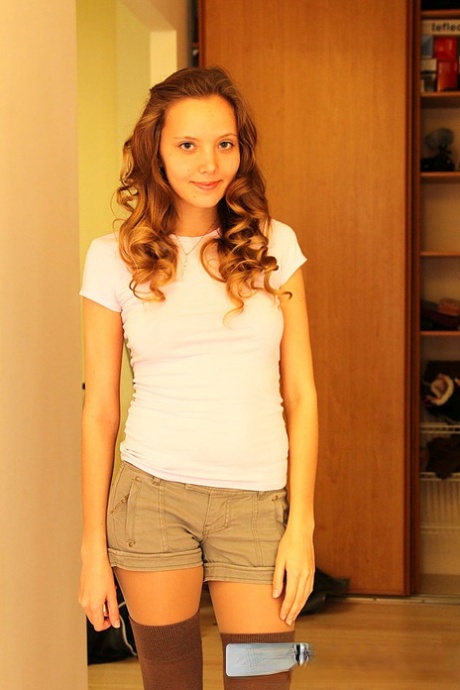 Young amateur Katya shows her butt cheeks in homemade solo shoot