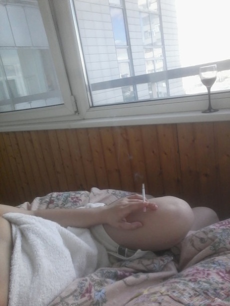 Gorgeous amateur babe takes selfies of her sexy boobs and inked body