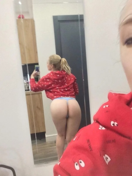 Saucy amateur babe stripping and posing naked in front of the mirror