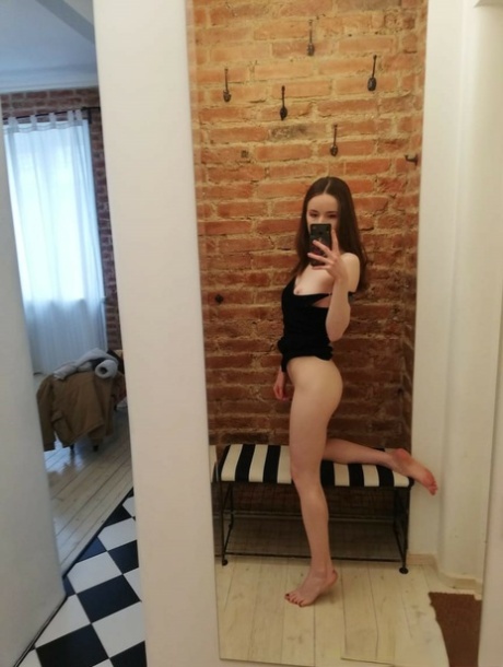 Skinny amateur teen posing naked and in her sexy dress in the mirror