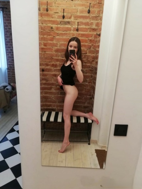 Skinny amateur teen posing naked and in her sexy dress in the mirror