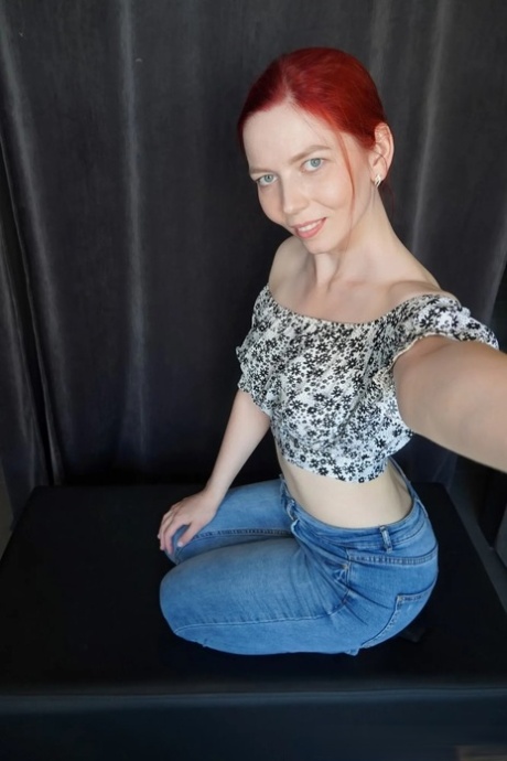 Beautiful redhead shows her small tits in a hot selfie compilation