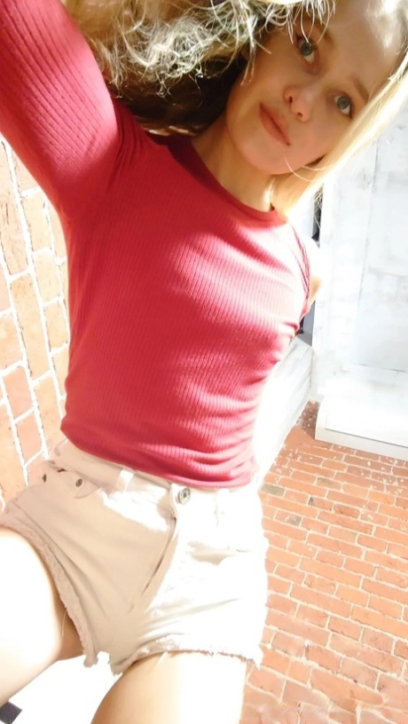 Skinny blonde babe takes some nude selfies showing her tiny tits & her hot ass