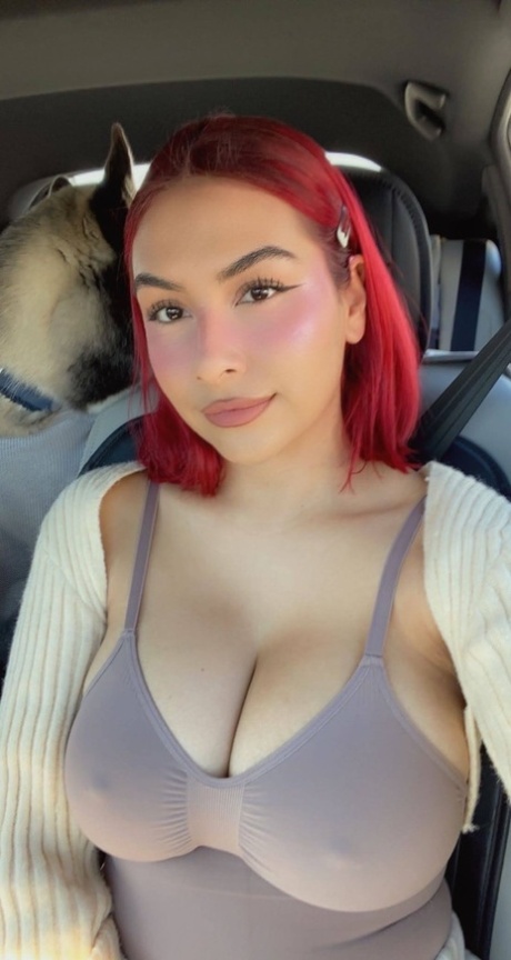 Curvy babe Angel takes selfies showing her big tits & her shaved pussy