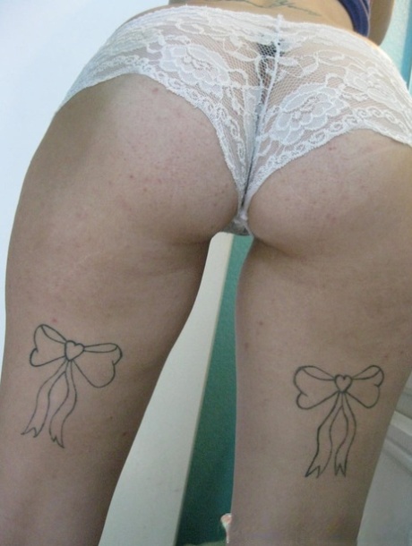 Inked amateur teen touches her hot pussy and shows her curvy body