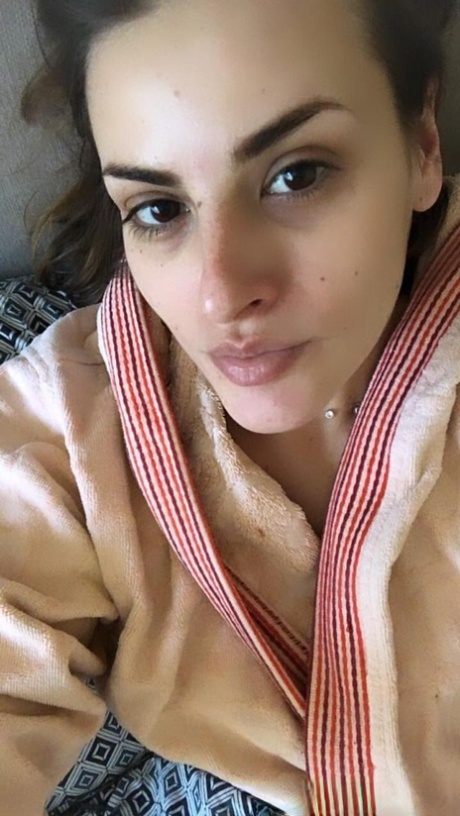 Amateur beauty shows her big tits and hot ass and poses in the mirror