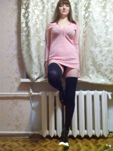 Amateur teacher doffs her pink dress and plays with her huge boobs and a toy