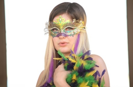 Solo model Danielle changes into a sun hat and dress before toying her twat