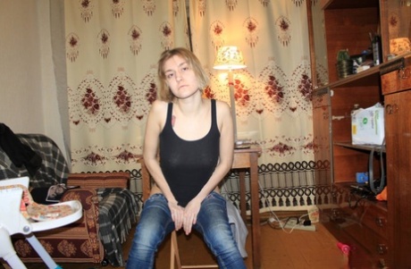 Hot babe with natural tits spreads her legs and sticks a toy in her pussy