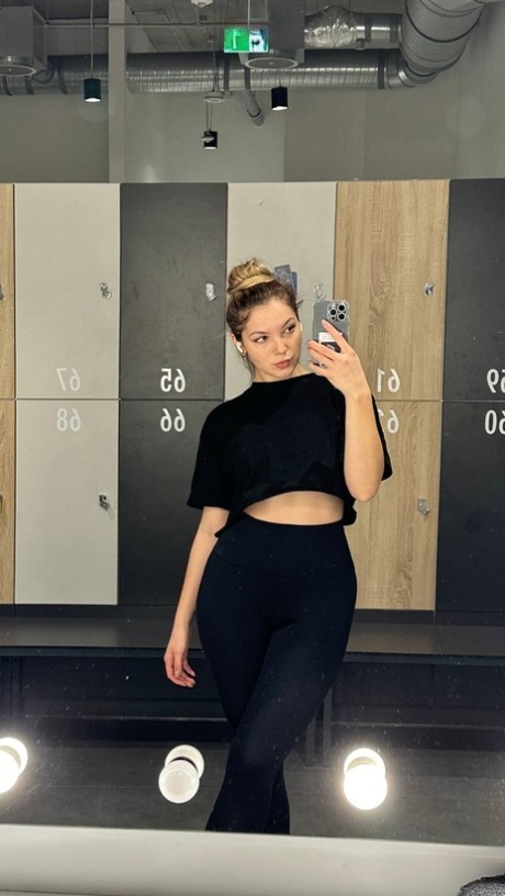 Glamorous OnlyFans babe All About Diana posing provocatively in a solo