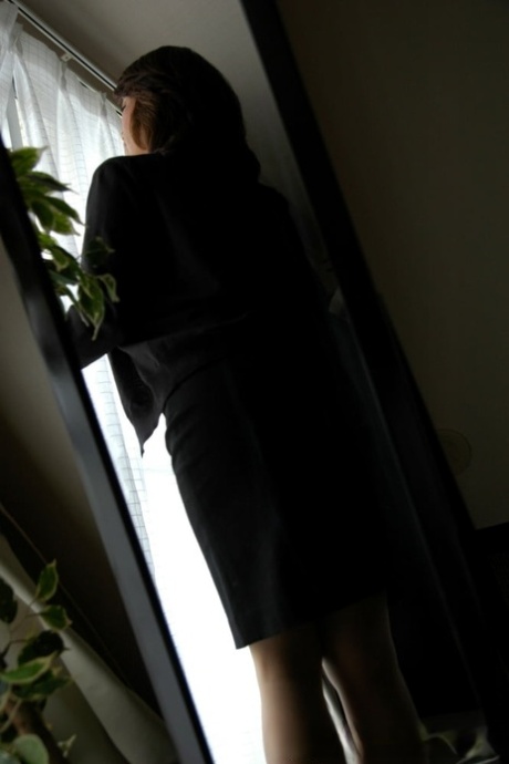 Mature Asian secretary shows her body and rides a dick in a hotel room