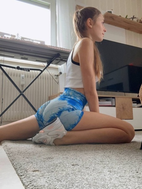 Cute young girl Katya Sun poses her numerous non-nude self shots