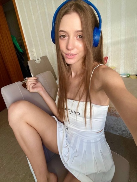 Cute young girl Katya Sun poses her numerous non-nude self shots
