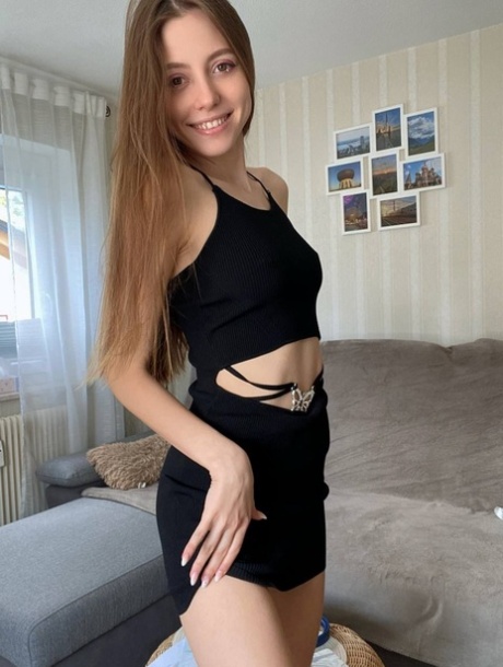 Cute young girl Katya Sun poses her numerous non-nude self shots