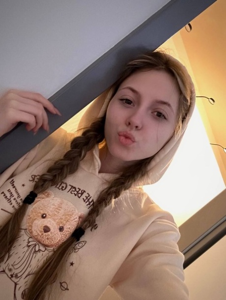 Cute young girl Katya Sun poses her numerous non-nude self shots