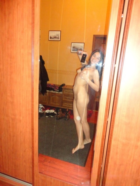 Amateur sweetheart eats a banana while showing off her natural tits & hot muff