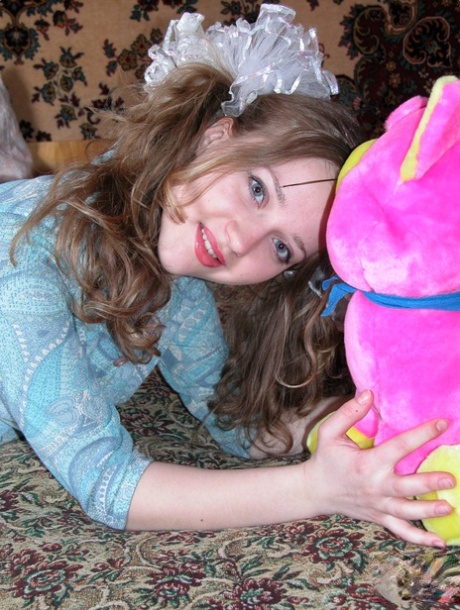 Barely legal teen Anya undresses in her bedroom and masturbates with a toy