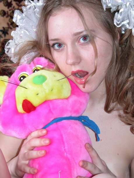 Barely legal teen Anya undresses in her bedroom and masturbates with a toy