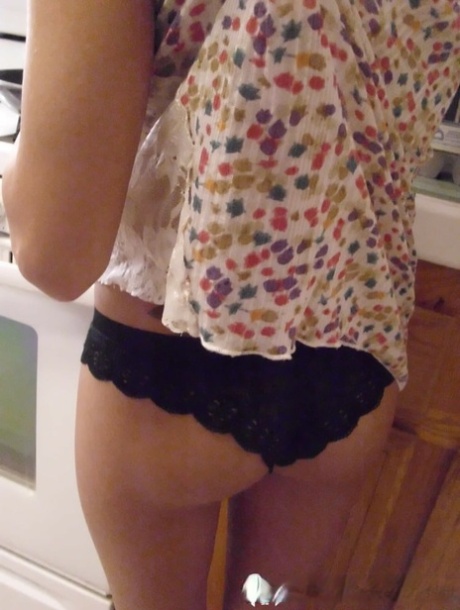 Pretty amateur wife Katty West strips and shows her big tits while cooking