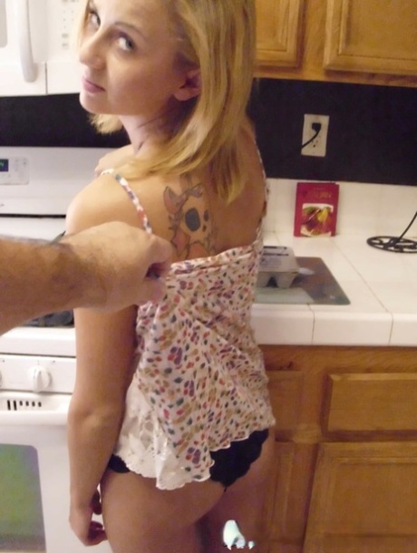 Pretty amateur wife Katty West strips and shows her big tits while cooking