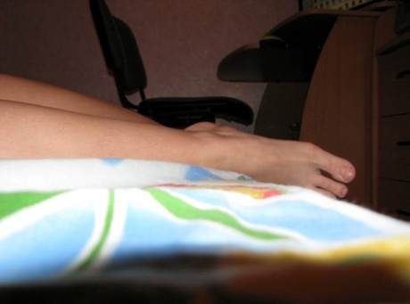 All-natural brunette strips off her silky nightgown and poses naked