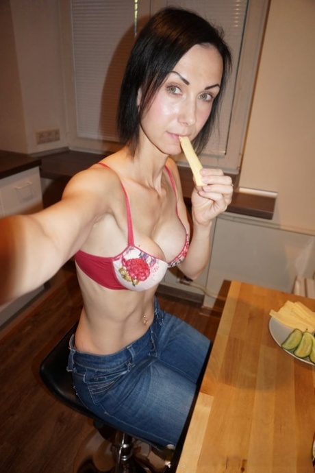 Skinny MILF displaying her big fake boobs in her own selfie compilation