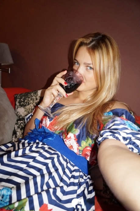 Blonde amateur shows her perfect teen tits while taking nude selfies