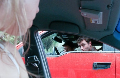 Young blonde Chastity Lynn gives a public blowjob to her man in the car