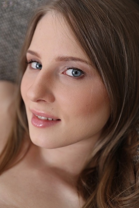 Blue eyed flat chested Nimfa toys her horny amateur pussy solo on the couch