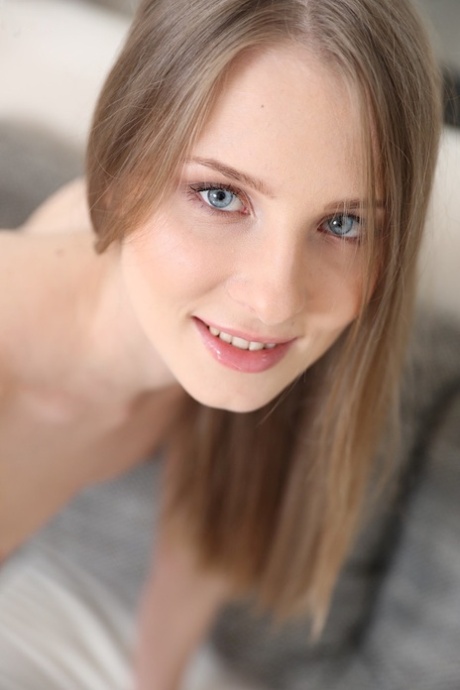 Blue eyed flat chested Nimfa toys her horny amateur pussy solo on the couch