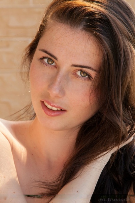 Young European brunette Rosett flashing up skirt pussy outdoors on balcony